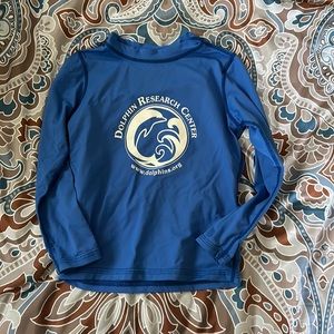 Dolphin research center in Florida rash guard